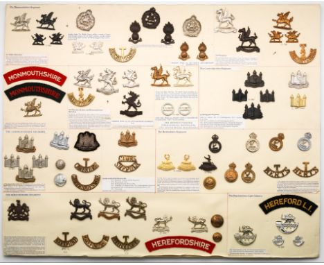 Insignia of County Territorial Regiments Cap and collar-badges, and shoulder-titles in cloth and metal, of the Cambridgeshire
