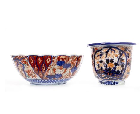 EARLY 20TH CENTURY JAPANESE IMARI CIRCULAR FLUTED BOWL decorated with floral panels, 31.5cm diameter; also a Japanese planter