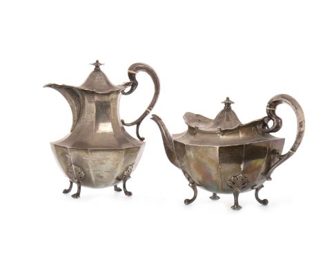 GEORGE V SILVER TEA AND COFFEE POTS maker R&W Sorley, Glasgow 1912, each of faceted baluster form, the rims cast with scrolls