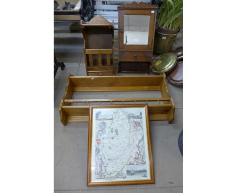 A pine wall shelf, two oak wall cabinets and a map of Nottinghamshire