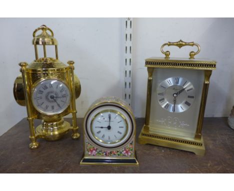 A Rapport London carriage clock with quartz movement, a brass weather station and a Wedgwood clock