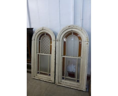 A pair of Victorian stained glass sash windows