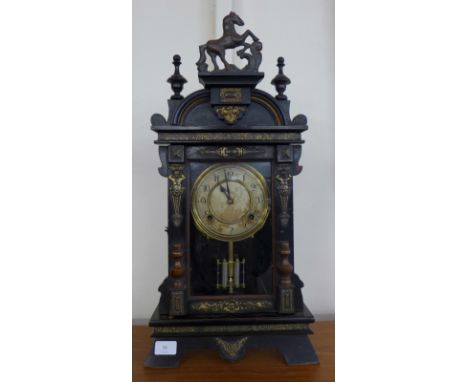 A 19th Century American ebonised and parcel gilt shelf clock