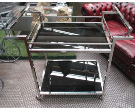 TEA TROLLEY, Art Deco style with black glass tray and shelf on a chromed metal frame, 100cm x 62cm x 92cm.