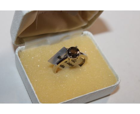 A Sterling silver and smoky topaz set ring, ring size R/S