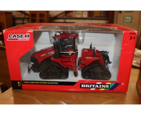 Three Britains Farm boxed 1:32 models: 42552 Case IH 600 Quadtrac, 42490 International 956XL tractor; 42802 International 956