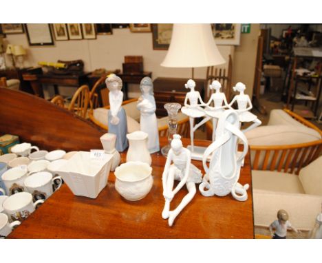 A quantity of ballerina figures; two Nao figures; four items of Belleek etc.
