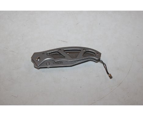 A Gerber pen knife. This item can only be purchased by someone over the age of 18 and ID verification may be required. Face t