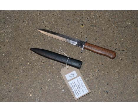 A German WWII pattern boot knife. This item can only be purchased by someone over the age of 18 and ID verification may be re