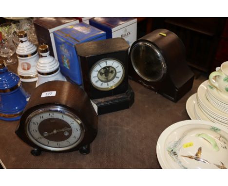 A Smiths Enfield oak cased two hole mantel clock; an oak cased three hole mantel clock; and a late Victorian mantel clock 