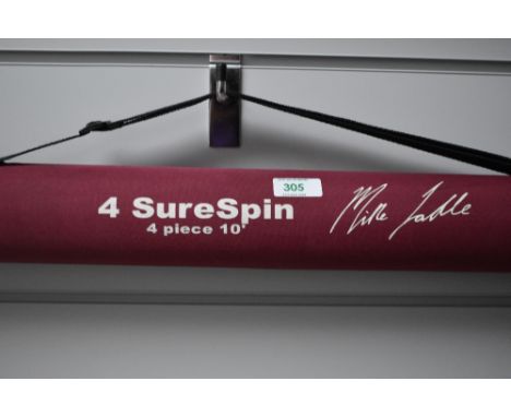 A Sure Spin 4pc 10ft spinning rod  by Mike Ladle in soft and hard original cases