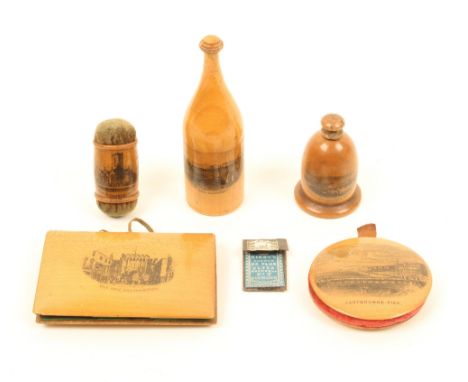 Five pieces of Mauchline ware, comprising; a girdle form pincushion (St. Mary's Church, Bridport), 4.7cm, a bottle form sewin