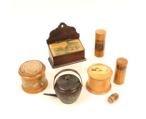Seven pieces of Mauchline ware, comprising; a circular dome top reel box (Ilkley Bridge - photographic), single bone side ape