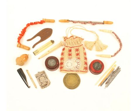 A mixed lot, comprising; three pairs of knitting needle protectors, two pairs in turned wood, one in bone, a beadwork decorat