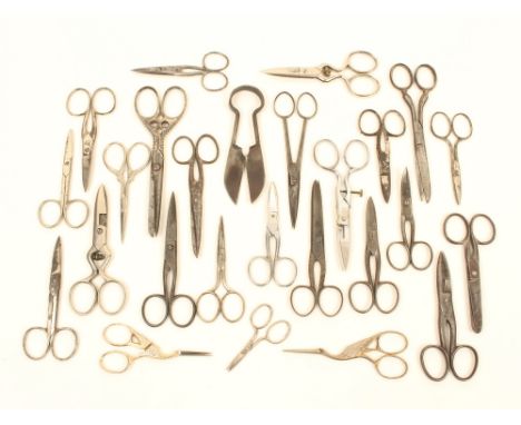 Twenty six pairs of steel scissors, including four button holing examples, a pair of shears, and a novice pair, largest 14.5c