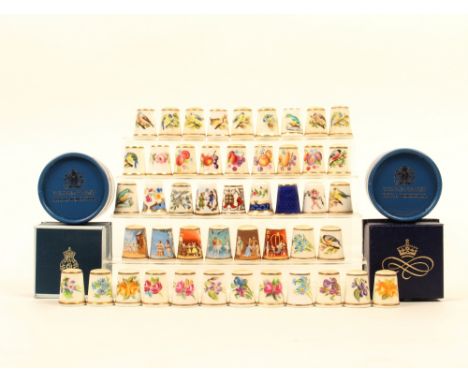 Forty Seven Royal Worcester black mark thimbles, mostly hand painted and signed, comprising; fourteen of birds, seven of frui