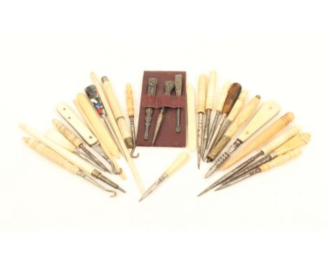 Twenty four sewing and other tools, suitable for sewing boxes, mostly with turned bone handles, including stilettos, crochet 