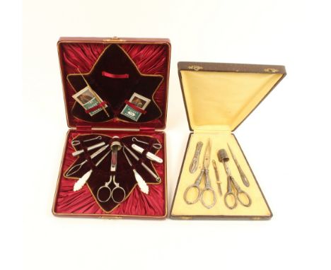 Two cased sewing sets, comprising; a six piece white metal set with decorated mounts, in tapering leatherette case, 16cm, and