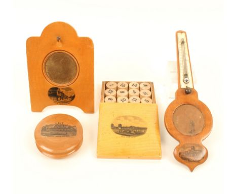 Four pieces of Mauchline ware, comprising; an easel form watch stand (Anne of Cleves House, Lewes), 14cm, a thermometer/watch