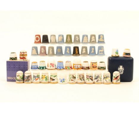 Forty three ceramic thimbles, comprising; eighteen by Wedgwood, a modern Meissen example, thirteen continental or continental