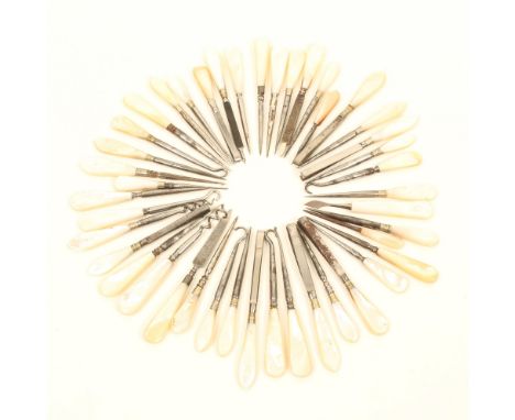 Forty three sewing and other tools, suitable for sewing boxes, all with plain mother of pearl handles, including stilettos, b