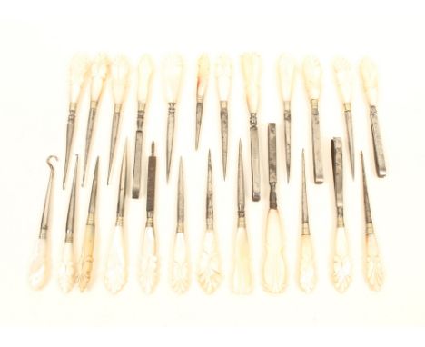 Twenty four sewing and other tools, suitable for sewing boxes, all with carved mother of pearl handles, including stilettos, 