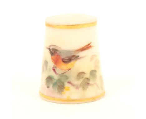 A puce mark Royal Worcester thimble, of a bird on a branch, signed, indistinct but possibly Powell.