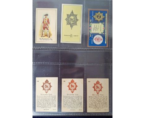Cigarette cards & Postcards, Specialised collection of Military cards In 9 modern double postcard sized albums. Each album ha