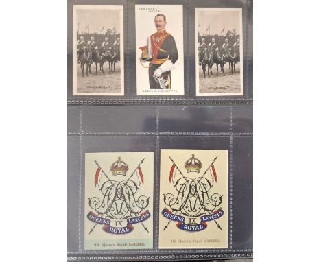 Cigarette cards & Postcards, Specialised collection of Military cards In 10 modern double postcard sized albums. Each album h