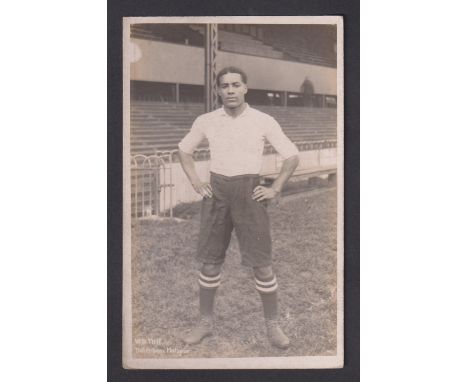 Football postcard, Tottenham Hotspur, photographic postcard showing Walter Daniel Tull, full length in Spurs kit by F.W. Jone