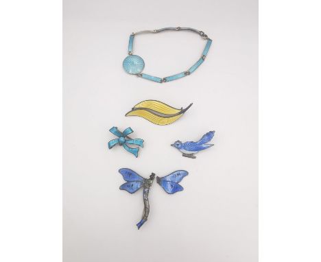 A collection of enamel jewellery, including a Danish pale blue guilloche enamel articulated bracelet, an Aksel Holmsen yellow