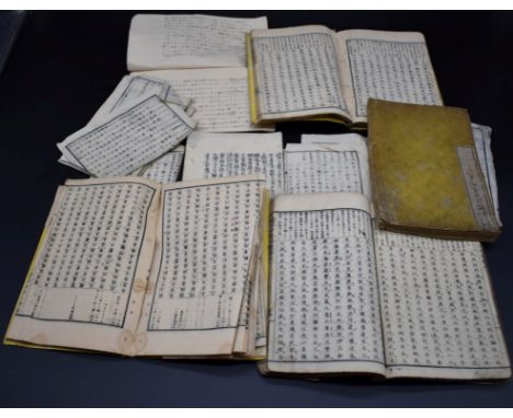 CHINESE BOOKS:&nbsp;a group of four unidentified Chinese printed books, late 19th-early 20thc, printed yellow paper bindings 