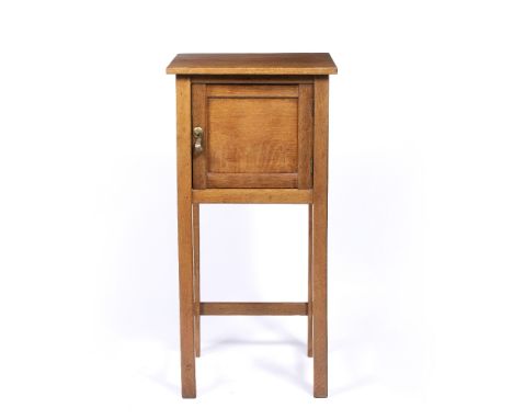 Gordon Russell (1892-1980) at the Russell workshop Light oak 'Dartington Pedestal' design number 699, circa 1928 with shaped 