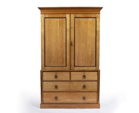 Brown and Lamont Cabinet makers of Chester Light oak, aesthetic movement wardrobe, with a hanging rail to the top compartment