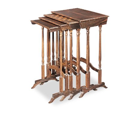 A set of 19th century rosewood quartetto tables, one with an inlaid chessboard topEach top with a moulded raised edge, on pai