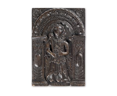 An early 17th century carved oak panel, Dutch/German, PrudenceOriginally part of a door, the figure of Prudence, wearing a ru
