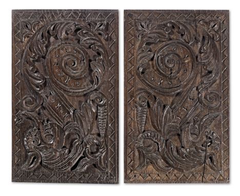 A pair of Charles I carved oak panels, probably Gloucestershire, circa 1640Each carved with an arrow-tongued leafy dragon wit