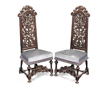 A pair of late 17th century walnut high-back chairs, Anglo-DutchIn the manner of Daniel Marot (1661-1752)Each with an elabora