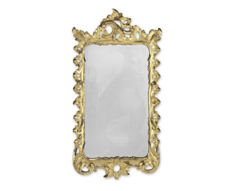 A George II style giltwood mirrorHaving a carved and pierced rocaille frame, 55cm x 106cmFor further information on this lot 