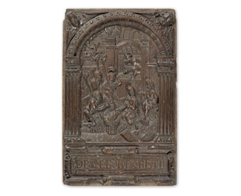 A late 16th/early 17th century carved oak panel, Flemish, The NativityThe central scene, including cows in their byre, carved