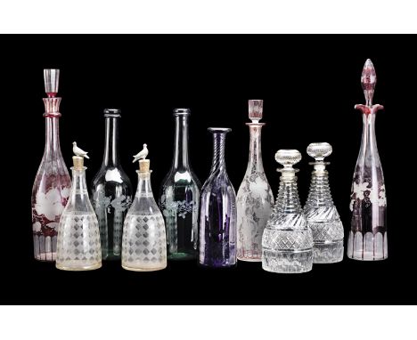 A group of 19th century glass decanters,Comprising a pair with step cut necks and hobnail friezes, 23cm, a pair with etched c