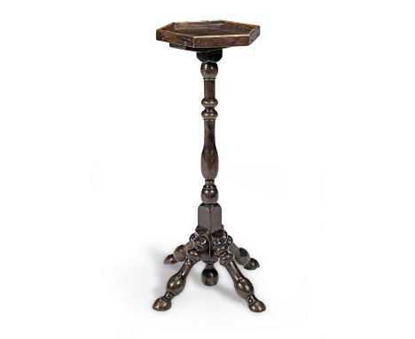 A William and Mary oak and ash turner's candlestand, circa 1700 and laterHaving a small boarded hexagonal and galleried top, 