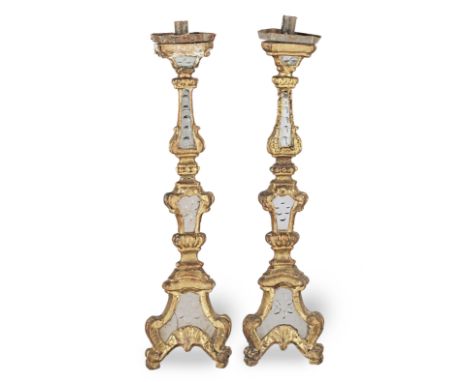 A pair of late 18th century giltwood and etched glass altar candlesticks, ItalianOne damaged and with socket and upper turnin