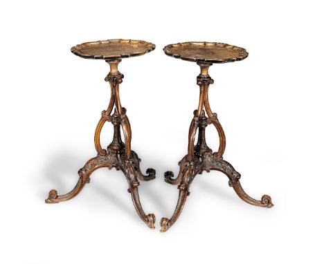 A pair of Chippendale-Revival walnut tripod occassional tablesEach having a one-piece piecrust edge top, a Rococo C-scroll an