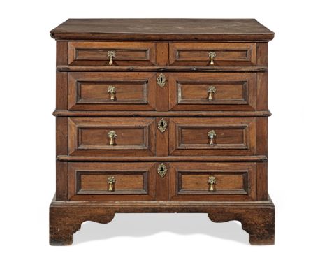 A joined walnut chest of drawers, English, circa 1700Having a typical thin boarded top, and four long twin mitre-moulded draw