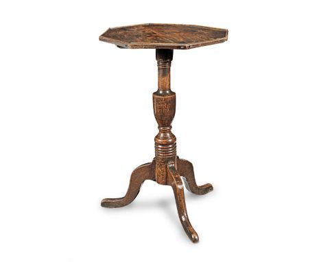 A George III elm and ash wine table, circa 1770Having an octagonal top with applied moulded edge, a vase-turned pillar and th