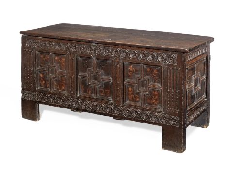 A fine James I joined oak and inlaid coffer, dated 1623With boarded top, the front of three panels, each with inner-frame mou