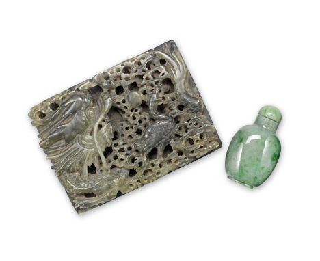 A carved jade lidded box, Chinese, circa 1900-20The lid carved with a scaly-dragon chasing a bird, 12.5cm wide x 9cm deep x 6