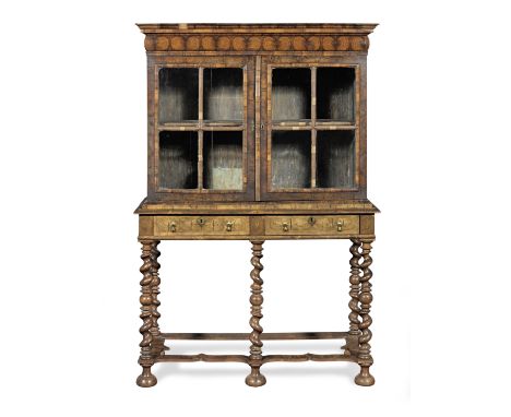 A William &amp; Mary olive-wood oyster-veneered, fruitwood and walnut cabinet-on-stand, circa 1690 and laterHaving a moulded 