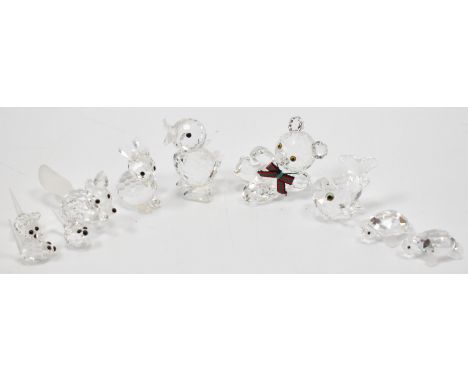 A group of seven Swarovski crystal animal figurines. The lot to include two turtles ( 220960), a fox (7677), a duck (7660), t